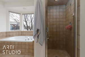 Bathroom with plus walk in shower