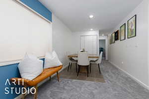 Dining space featuring carpet flooring