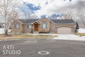 Single story home with a garage