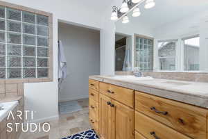 Bathroom with vanity and walk in shower