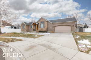 Single story home featuring a garage