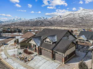 Snowy aerial view with a mountain view