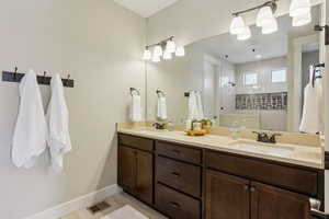 Bathroom with walk in shower and vanity