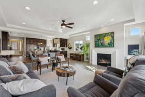 Living room with plenty of natural light and ceiling fan