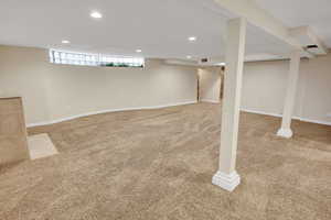 Basement featuring carpet floors