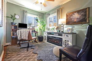 Living area featuring ceiling fan