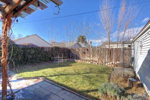 View of yard with a patio