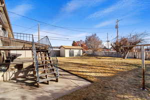 View of yard featuring a storage shed