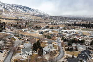 Snowy aerial view with a mountain view