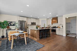 Recently updated kitchen, custom cabinetry, granite countertops, engineered hardwood floors.