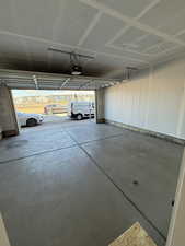 Garage featuring a garage door opener