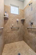 Bathroom with tiled shower