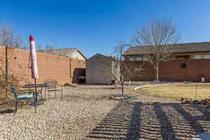 View of yard with a shed