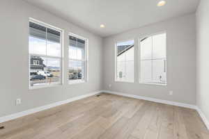 Empty room featuring light hardwood / wood-style floors