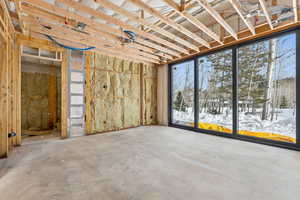 Miscellaneous room featuring concrete floors