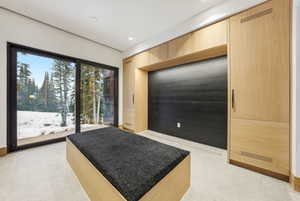 Bedroom with access to exterior and recessed lighting