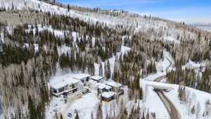 Snowy aerial view with a mountain view