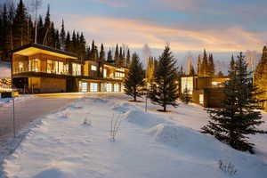 View of front of property with a balcony