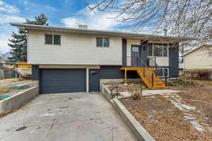 View of front of home featuring a garage