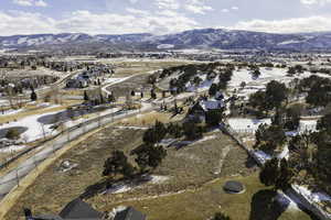 Snowy aerial view with a mountain view