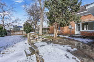 View of yard covered in snow