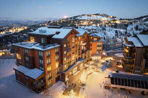 Snowy aerial view with a mountain view