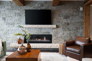 Living room with beamed ceiling