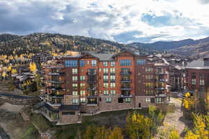 View of property with a mountain view