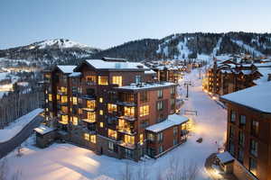 Snowy aerial view with a mountain view