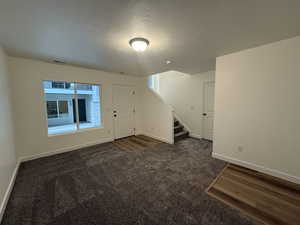 Interior space with a textured ceiling