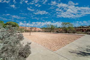 View of home's community with volleyball court