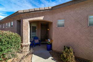 Entrance to property featuring a patio area