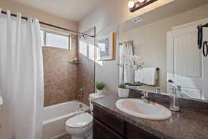 Full bathroom featuring shower / tub combo