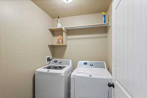 Laundry room with shelving (washer and dryer excluded )