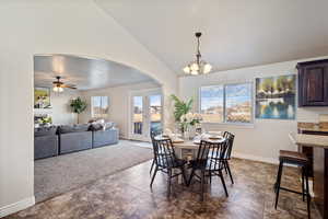 Tiled  dining space with vaulted