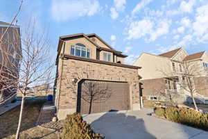 View of property with a garage