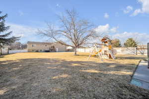 View of yard featuring a playground