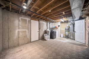 Basement with walkout entrance to backyard and independent washer and dryer hookups