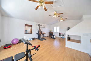 Family room or workout room with vaulted ceiling