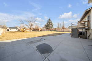 View of patio featuring outbuildings