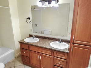 Full bathroom with double vanity