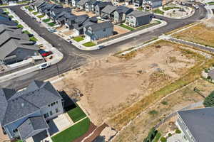 Aerial overview of property's location featuring nearby suburban area