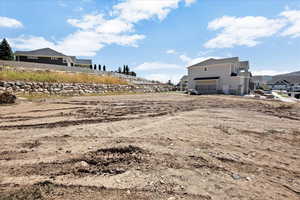 View of yard with a garage