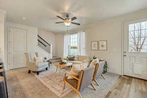 Living room featuring a ceiling fan