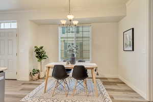 Dining area featuring a notable chandelier