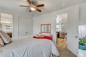 Bedroom with ensuite bathroom and a spacious closet