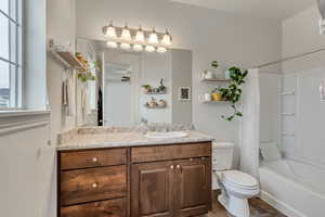 Full ensuite bathroom featuring shower / bathtub combination