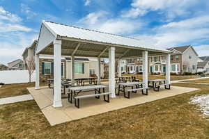 View of property's community featuring a gazebo and picnic tables