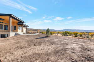 View of yard with a mountain view