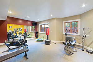 Workout room featuring carpet flooring